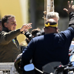Bolsonaro encabeza caravana con simpatizantes tras semana de tensiones