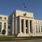 Reserva Federal prevé tres aumentos de tasa de interés para 2022