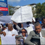 Desalojados de la avenida Ecológica protestan frente al Palacio Nacional