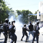 En imágenes: disturbios entre policías y miembros del PLD