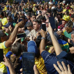 Bolsonaro, recibido por multitud en primer acto público tras volver a Brasil