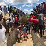 Haitianos preparan muro de hormigón armado para conectar río Masacre