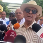 Hipólito Mejía y Juan Garrigó acuden a ejercer su voto