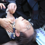 El detenido por apuñalar al líder opositor de Corea del Sur, es imputado por intento de asesinato