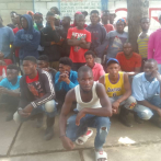 Braceros haitianos repatriados tras incidente ya se encuentran con sus familiares
