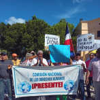 Protestan frente al Palacio Nacional contra los desalojos, en el Día de la Vivienda Digna