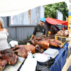 Vendedores de cerdo asado en Santo Domingo muestran reflexiones distintas en vísperas de Nochebuena