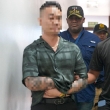 Aplazan medida de coerción contra chino propietario de Mudan acusado de violencia de género