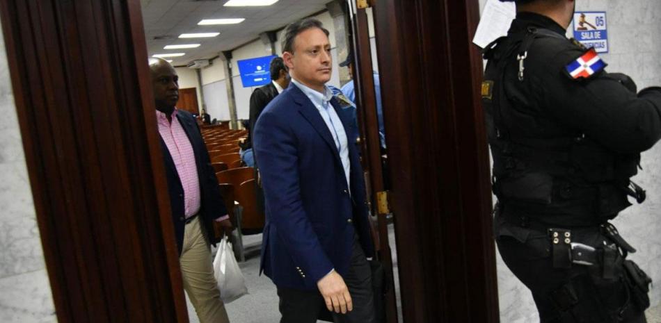El exprocurador general de la República, Jean Alain Rodríguez, asiste a la corte para enfrentar las acusaciones de corrupción administrativa que le imputa el ministerio público.