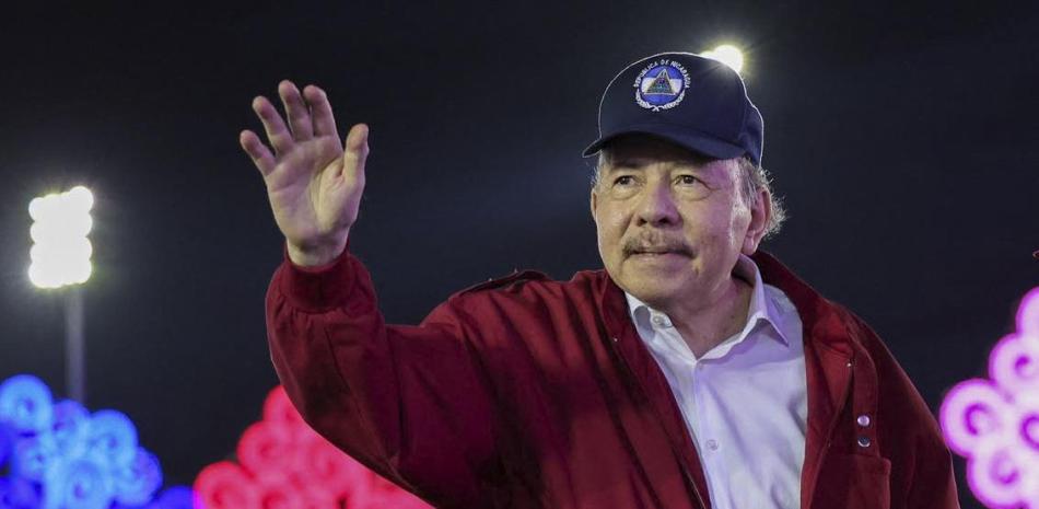 This handout picture released by Nicaragua's government via the official El 19 Digital news outlet shows Nicaragua's President Daniel Ortega waving during an event to commemorate the 47th anniversary of the Nicaraguan Revolution in Managua, on July 19, 2026. (Photo by Cesar PEREZ / El 19 DIGITAL / AFP) / RESTRICTED TO EDITORIAL USE - MANDATORY CREDIT "AFP PHOTO / EL 19 DIGITAL / Cesar PEREZ " - HANDOUT - NO MARKETING NO ADVERTISING CAMPAIGNS - DISTRIBUTED AS A SERVICE TO CLIENTS