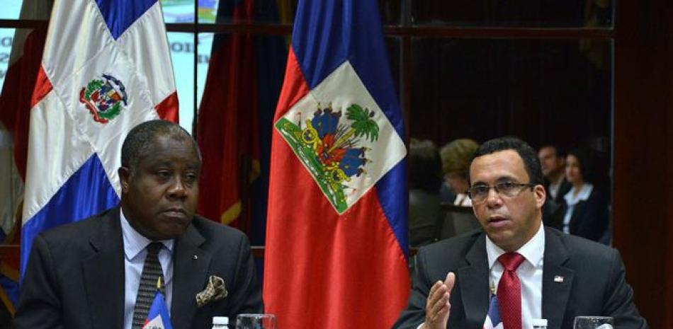 Archivo. El canciller dominicano Andrés Navarro y su colega haitiano Lener Renauld, durante la última visita realizada al país por el jefe de la diplomacia de Haití.
