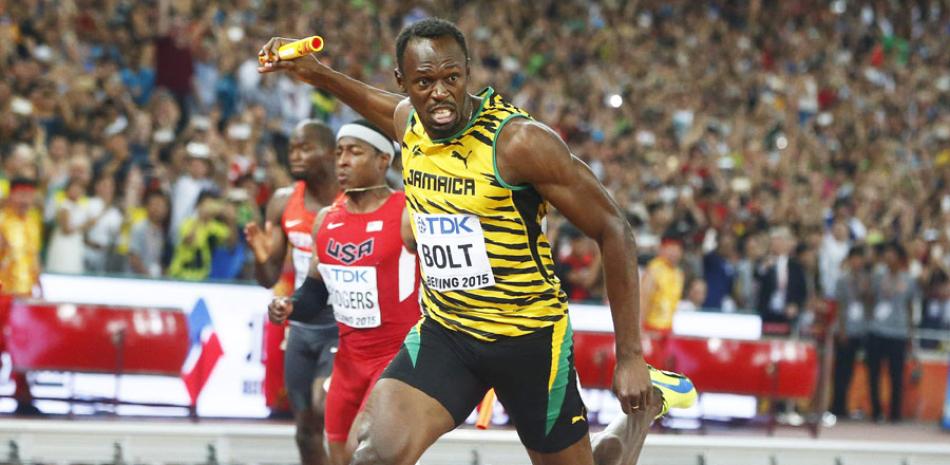 El Rey de la Velocidad. El ya legendario velocista Usain Bolt, de Jamaica, trae el oro de los 4x100m en el relevo de hombres durante las competencias en el Campeonato IAAF Mundial, en Beijing, China.
