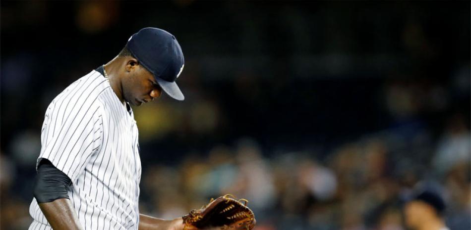 El lanzador dominicano Michael Pineda, de los Yankees, reacciona tras abandonar el montículo en el partido de este martes.