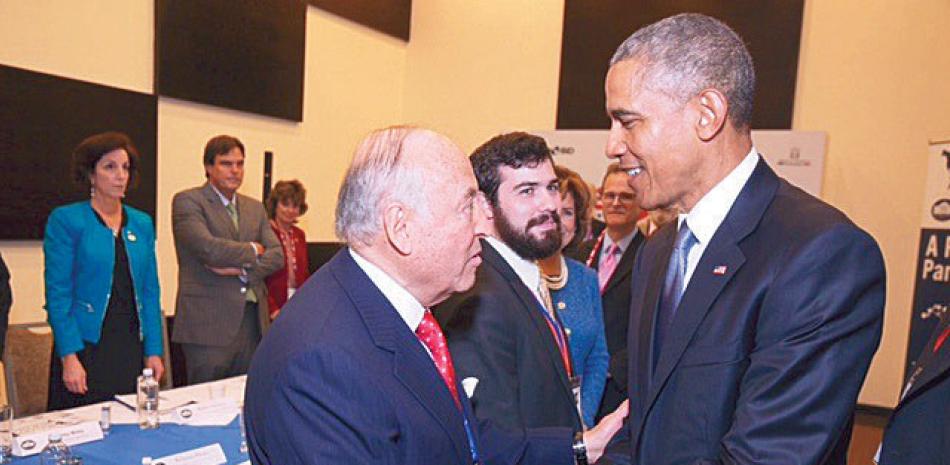 Enrique García, presidente ejecutivo de CAF; y el presidente de Estados Unidos, Barack Obama.