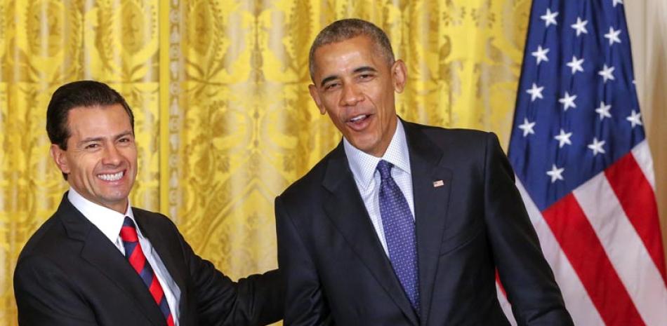 Casa Blanca.El presidente mexicano, Enrique Peña Nieto, izquierda, estrecha la mano de su homólogo estadounidense, Barack