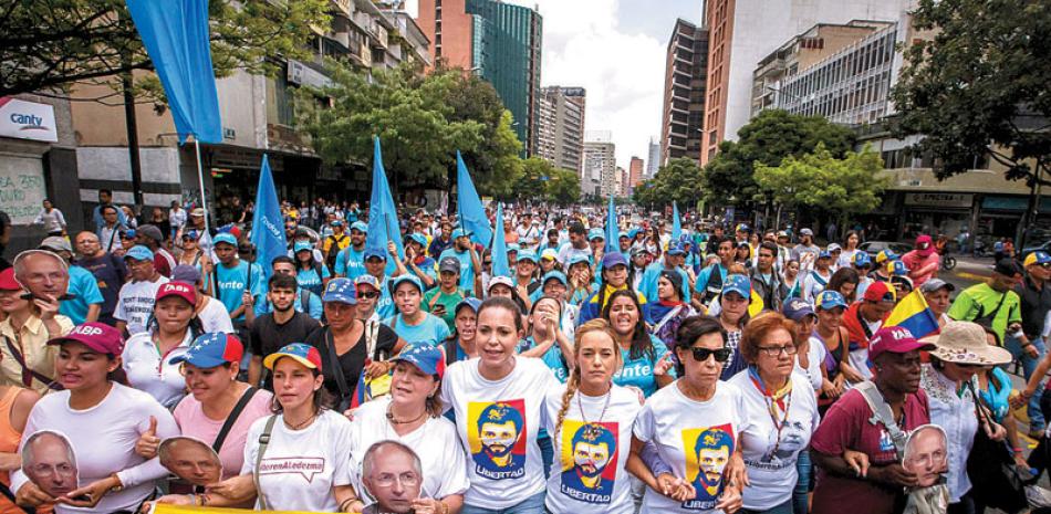 Opositoras. Desde la izquierda: Mitzi Capriles, esposa del alcalde mayor de Caracas Henrique Capriles; la dirigente opositora María Corina Machado; Lilian Tintori, esposa del líber opositor Leopoldo López.
