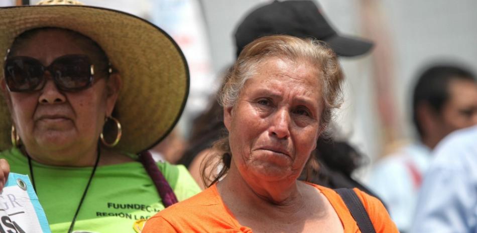Una mujer se lamenta durante la VI Marcha por la Dignidad Nacional "Madres buscando a sus hijos, hijas, verdad y justicia" ayer en Ciudad de México (México).  (EFE/Sáshenka Gutiérrez)
