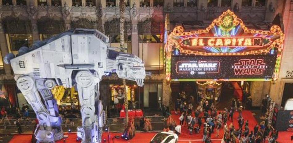 IMAGE DISTRIBUTED FOR NISSAN - Hollywood Blvd was abuzz as Star Wars: The Last Jedi opened at the famed El Capitan Theatre. Leading the charge, literally, was the all-new Nissan Leaf and its 'Leaf to Home' charging unit added an additional charge to the surroundings - all while a life sized AT-M6 looked on, on Thursday, Dec. 14, 2017 in Los Angeles. (Photo by Colin Young-Wolff/Invision for Nissan/AP Images)