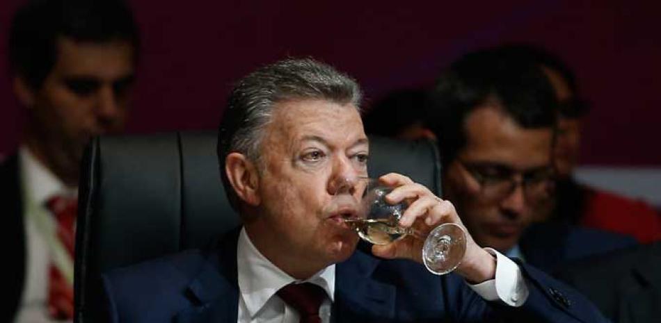 Punto. El presidente colombiano Juan Manuel Santos aseguró que el secuestro y asesinato de un equipo periodístico del diario El Comercio.