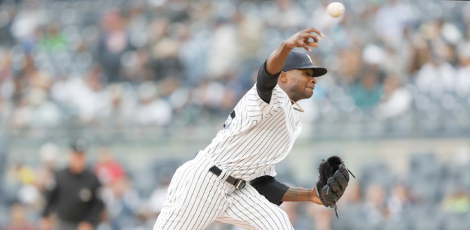 Domingo Germán, de los Yankees, aparece en su labor como abridor ayer contra los Indios de Cleveland en el Yankee Stadium.