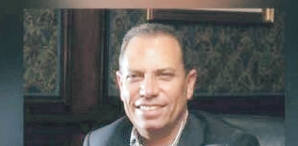 Garibaldy Bautista, presidente de la Federación Dominicana de Softbol.