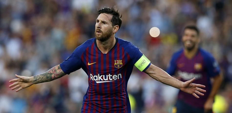 Lionel Messi, del Barcelona, celebra tras marcar uno de los tres goles que anotó este martes en el inicio de la fase de gruipos de la Liga de Campeones.