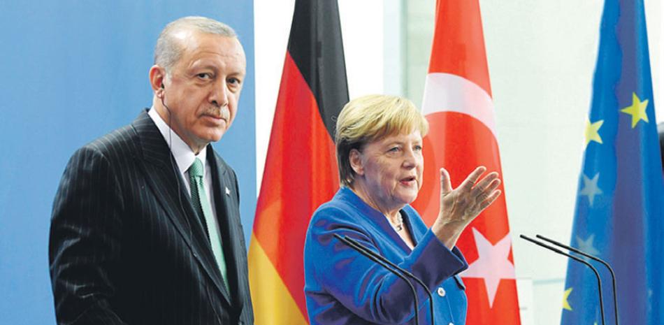 Recep Tayyip Erdogan y Angela Merkel.