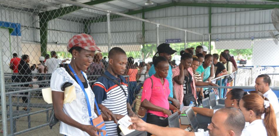 La mayoría. El 98% de los extranjeros que acudieron a recibir el carné del Plan de Regularización corresponde a haitianos.