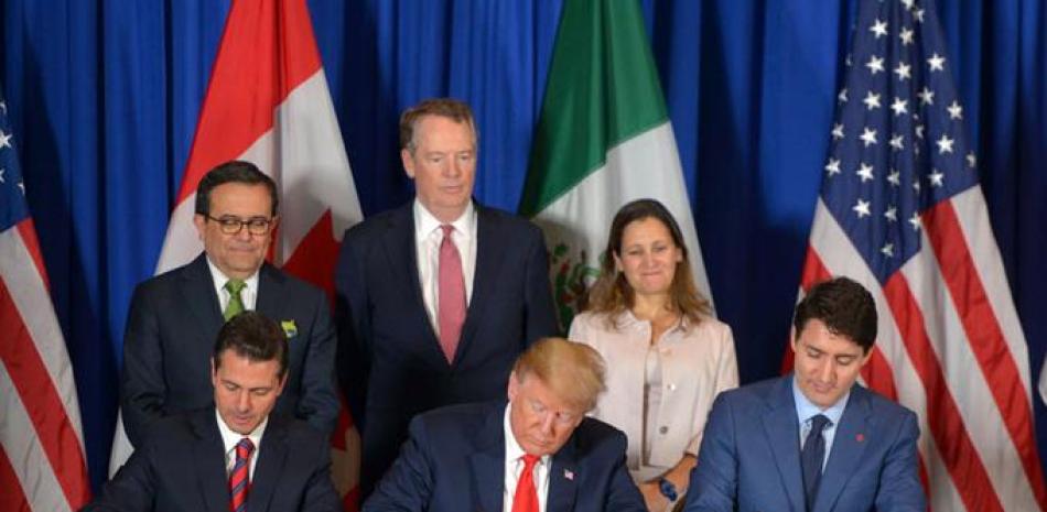 Acuerdo. Donald Trump (Estados Unidos) y Enrique Peña Nieto (México) y Justin Trudeau, firmaron el nuevo acuerdo comercial.