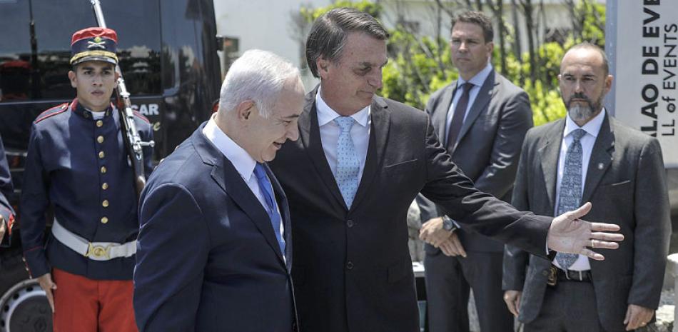 Visita. El presidente electo de Brasil, Jair Bolsonaro (izquierda), junto al primer ministro de Israel, Benjamin Netanyahu, quien realiza una histórica visita de cinco días a esa nación sudamericana.