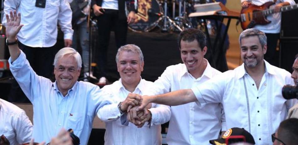 MANDATARIOS. El presidente de Chile, Sebastián Piñera; el presidente de Colombia, Iván Duque; el jefe del Parlamento venezolano, Juan Guaidó, y el presidente de Paraguay, Mario Abdo Benítez, participan en el concierto por Venezuela ayer en Cúcuta, Colombia.