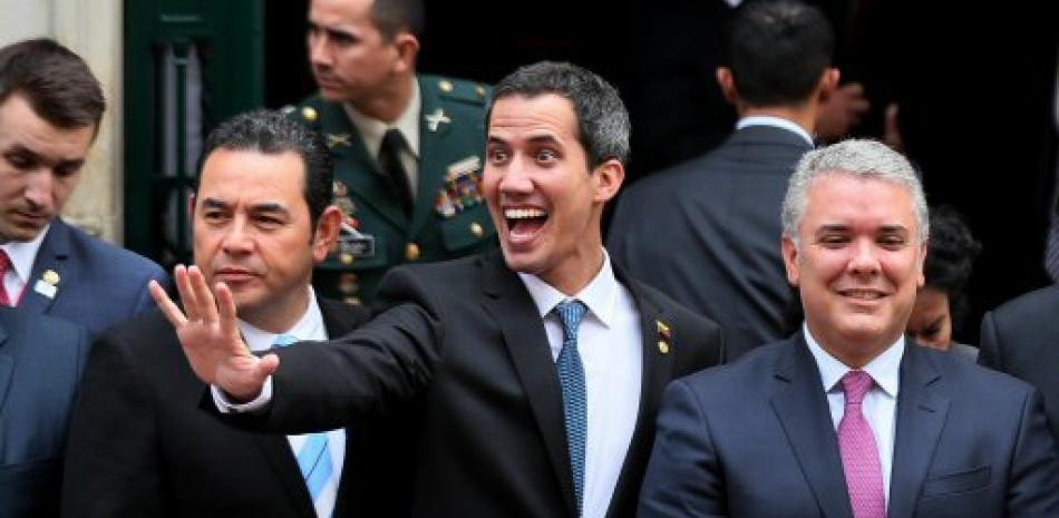 El presidente de guatemala, Jimmy Morales, el mandatario interino de Venezuela, Juan Guaidó, y el presidente de Colombia, Iván Duque. Foto AP