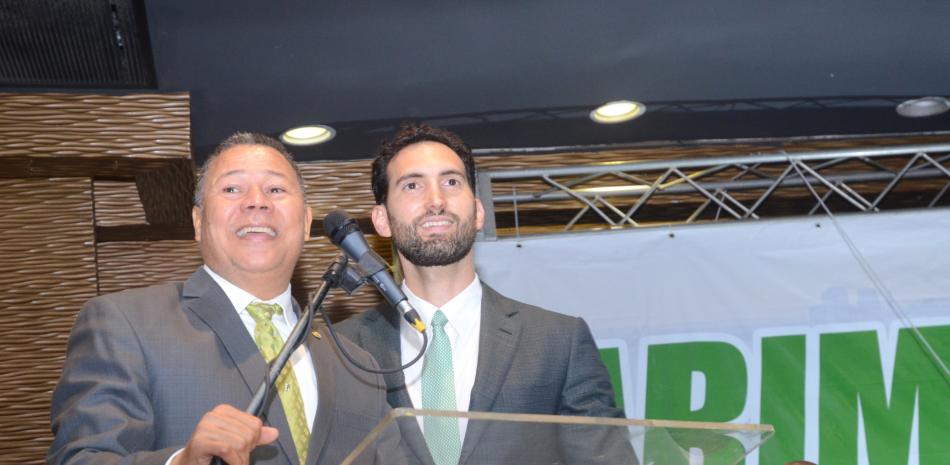 El presidente del Partido Verde, José Antolín Polanco junto a Karim Abu.