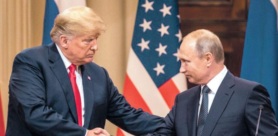 Trump y Putin conversaron vía telefónica por más de una hora. EFE / AFP