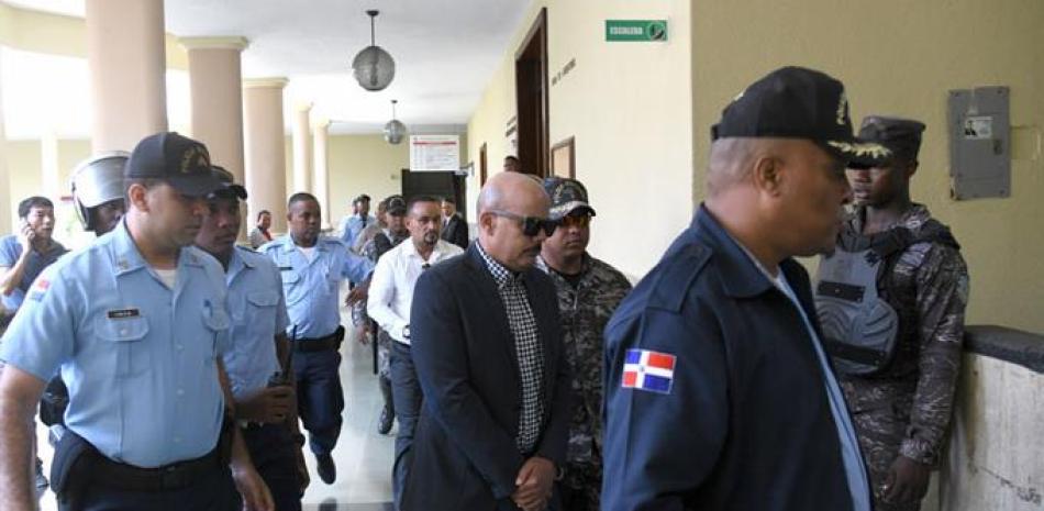 Conducción del general José Acosta Castellanos a la cárcel del Palacio de Justicia de Ciudad Nueva.