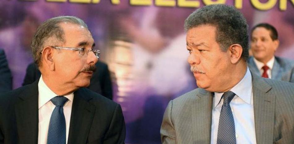 Danilo Medina y Leonel Fernández son los únicos dirigentes que han llevado al PLD al gobierno. ARCHIVO