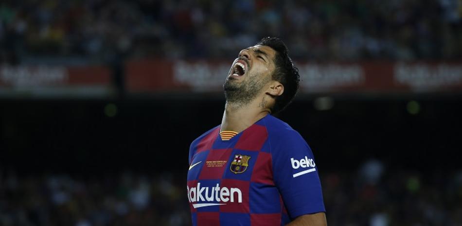 Luis Suárez, del Barcelona, reacciona durante un momento del partido de este domingo frente al Arsenal