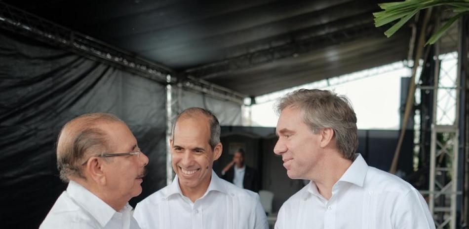 El presidente Danilo Medina felicita Juan Ignacio Rubiolo y Edwin de los Santos.