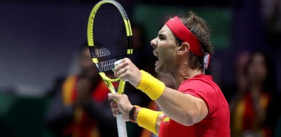 Rafael Nadal reacciona jubiloso luego de ganar en dobles haciendo pareja con Pablo Carreño.