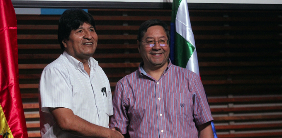 Evo Morales junto a Luis Arce. / EFE