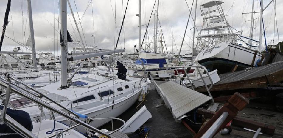 Barcos apilados en una marina tras el paso del huracán Isaías en Southport, Carolina del Norte, el 4 de agosto de 2020. (AP Foto/Gerry Broome, File)