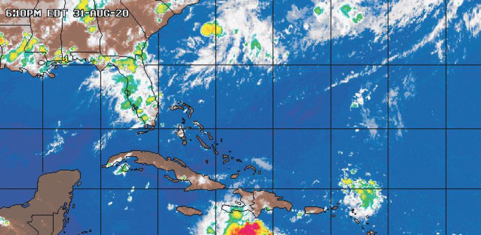 La zona de baja presión se ubicaba anoche al sur de Haití, con movimiento hacia el oeste. /WETHER CHANNEL