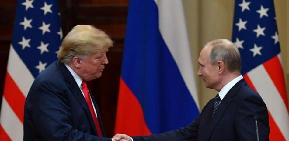 Donald Trump y Vladimir Putin. AFP
