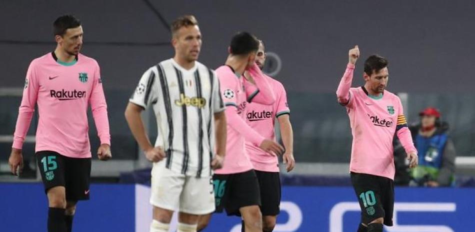 El argentino Lionel Messi (derecha), del Barcelona, festeja luego de anotar frente a la Juventus en un encuentro de la Liga de Campeones, disputado este miércoles.