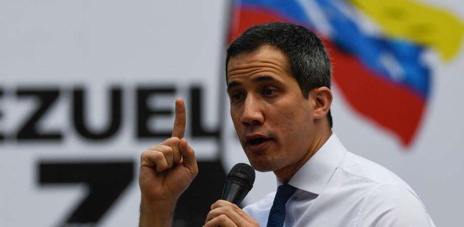 Juan Guaidó, pronuncia un discurso durante un mitin en el lanzamiento de la campaña "Venezuela alza la voz" en Caracas. Federico Parra / AFP