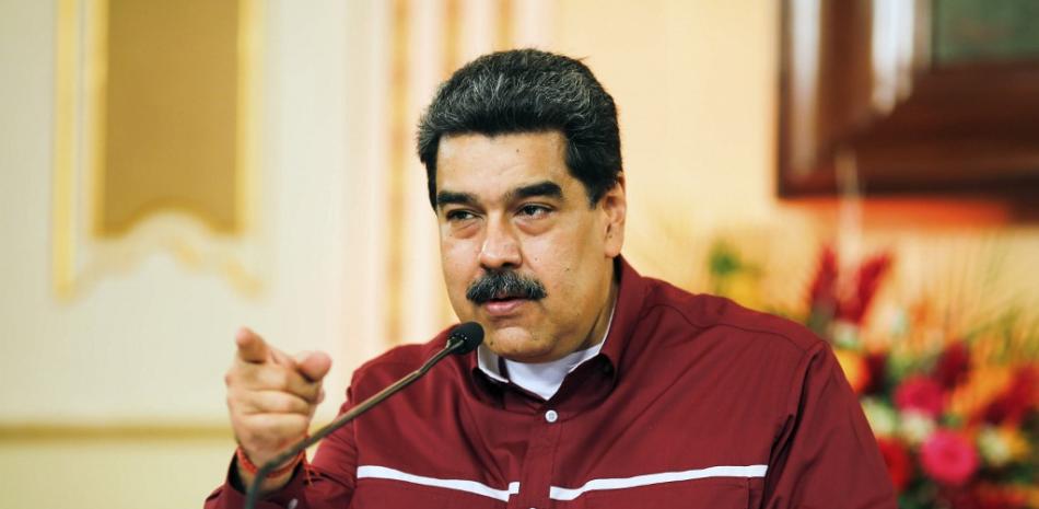 El presidente de Venezuela, Nicolás Maduro, durante un anuncio televisado, en el Palacio Presidencial de Miraflores en Caracas. JHONN ZERPA