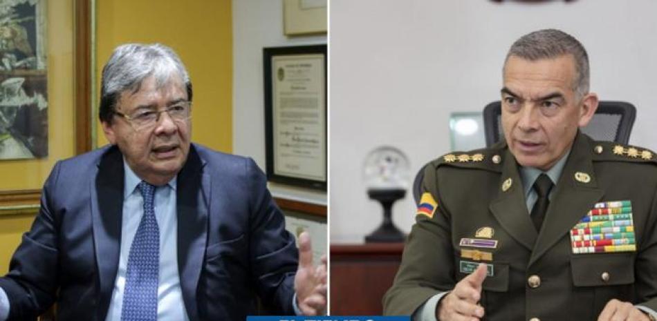 MInisro de Defensa Carlos Holmes Trujillo, y Oscar Atehortúa Duque, director de la Policía Nacional,