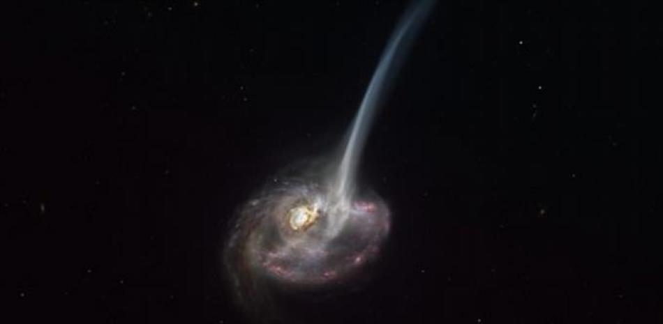 La impresión de este artista de ID2299 muestra la galaxia, el producto de una colisión galáctica, y parte de su gas es expulsado por una "cola de marea" como resultado de la fusión.

Foto: EP/ ESO/ M. KORNMESSER