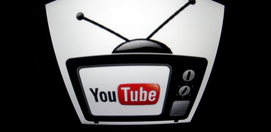 El logotipo de "YouTube" se ve en la pantalla de una tableta el 4 de diciembre de 2012 en París.

Foto: Lionel Bonaventure/ AFP