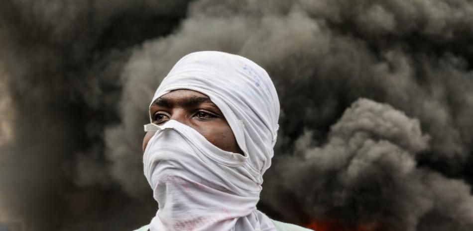 Los manifestantes de la oposición queman neumáticos durante una manifestación.
Valerie Baeriswyl / AFP